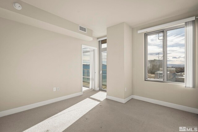 view of carpeted spare room