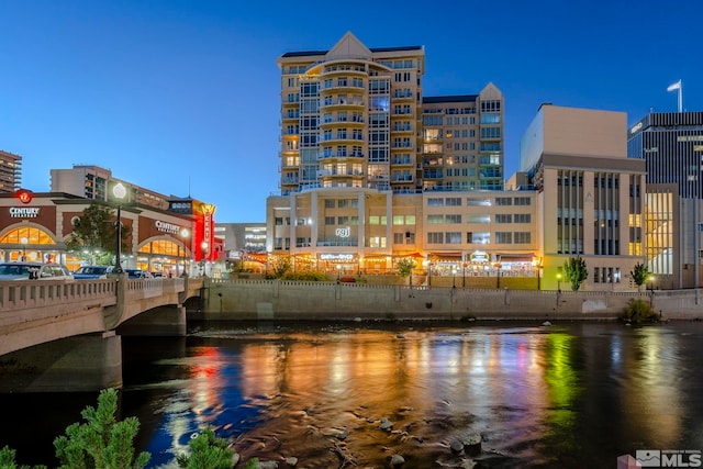 property's view of city with a water view