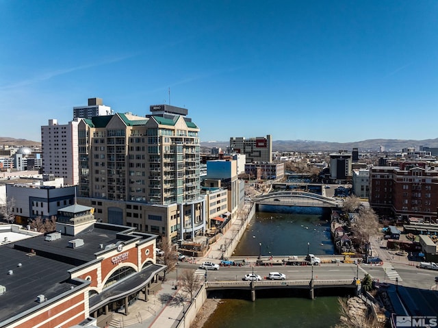 property's view of city featuring a water view