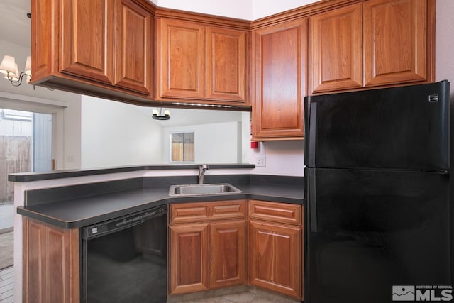 kitchen featuring sink and black appliances