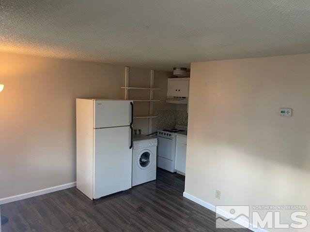 kitchen featuring white appliances, extractor fan, washer / dryer, dark hardwood / wood-style floors, and white cabinetry