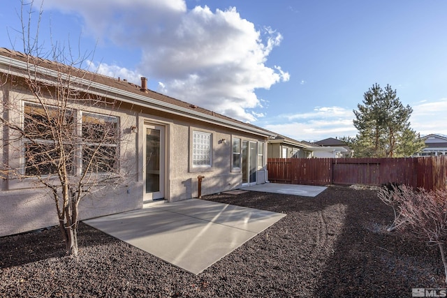 rear view of house featuring a patio area