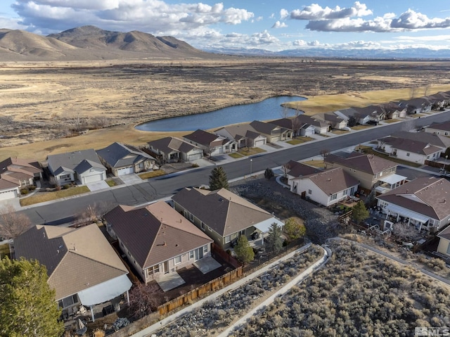 aerial view with a water and mountain view