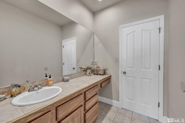 bathroom featuring tile patterned floors and vanity