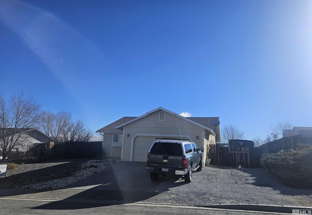 exterior space with a garage