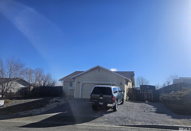 exterior space with a garage