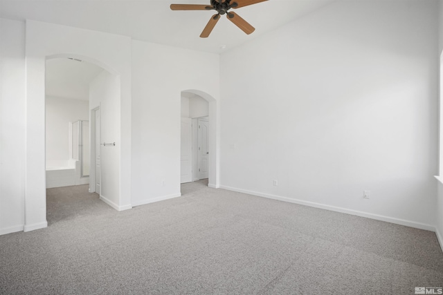 carpeted empty room with ceiling fan