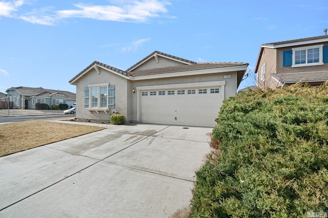 ranch-style home with a garage