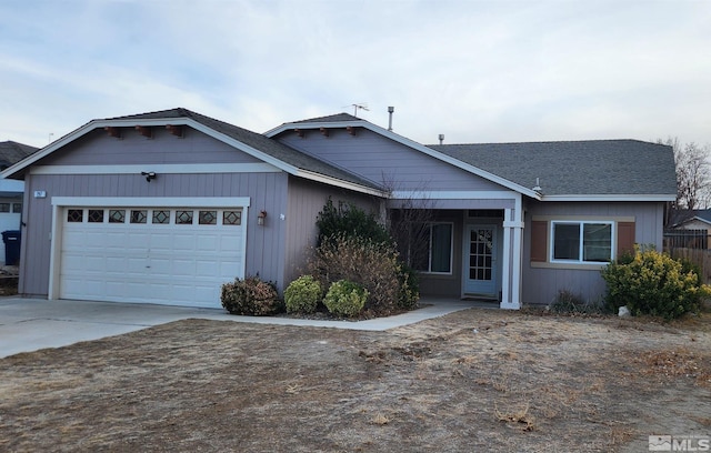 single story home with a garage