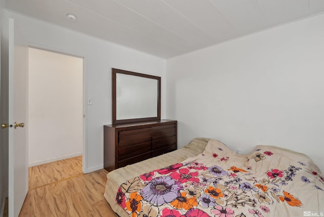 bedroom featuring hardwood / wood-style flooring