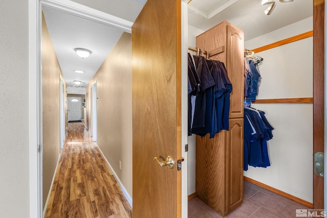 hallway featuring dark hardwood / wood-style floors