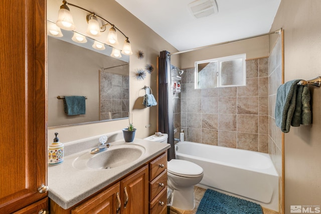 full bathroom featuring shower / tub combo, vanity, and toilet