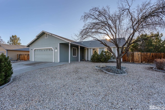 ranch-style house featuring a garage