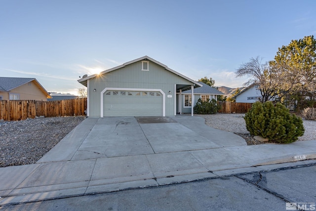 ranch-style home featuring a garage