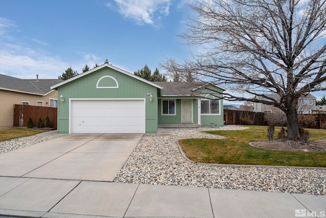 ranch-style house with a front yard and a garage