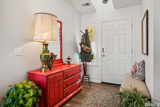 entryway with dark wood-type flooring