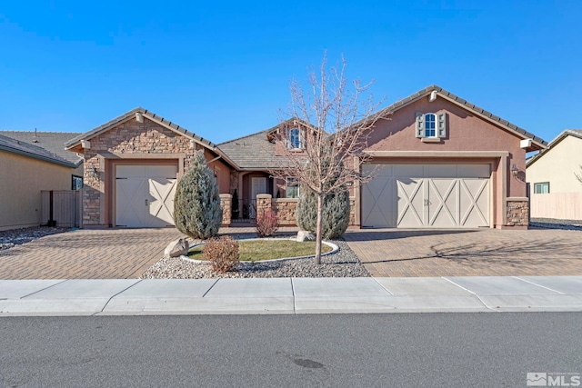 view of front of home with a garage