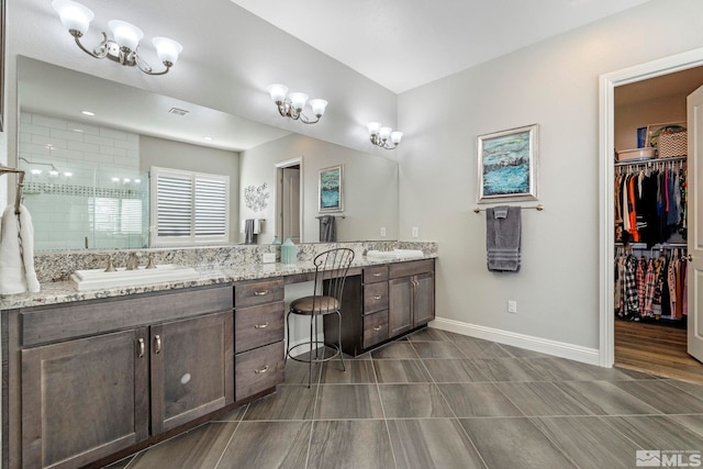 bathroom with vanity and walk in shower