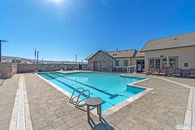 view of pool featuring a patio area