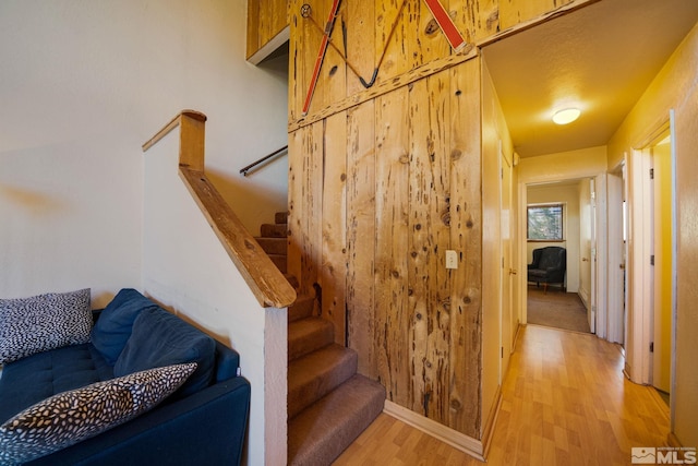 stairway featuring hardwood / wood-style floors