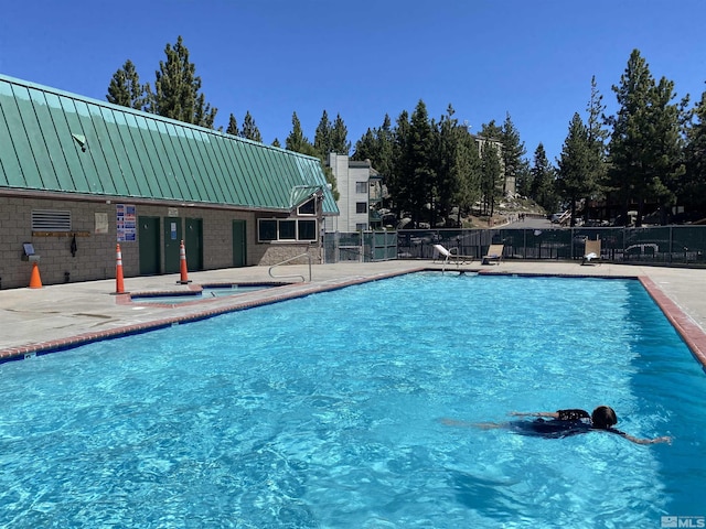 view of pool with a patio area