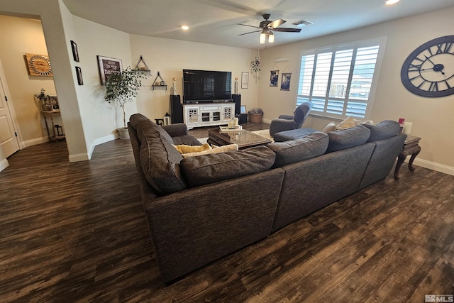 living room with ceiling fan and dark wood-type flooring