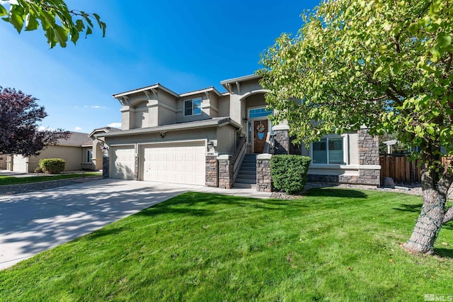 view of front of property with a front yard and a garage