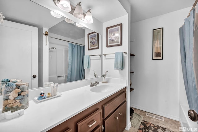 bathroom featuring shower / bathtub combination with curtain and vanity