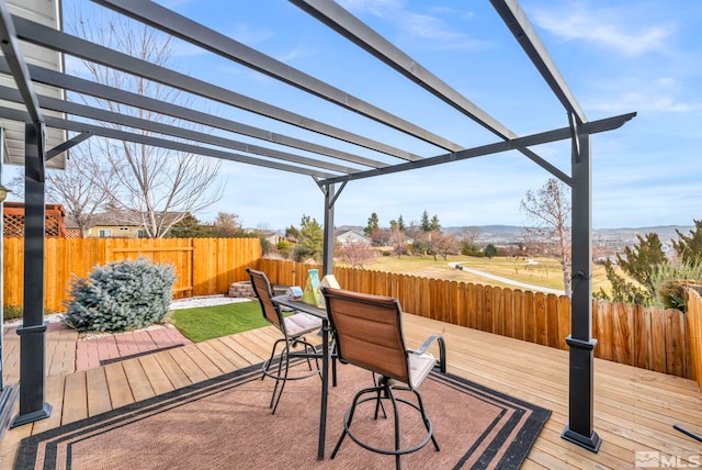 wooden terrace with a pergola