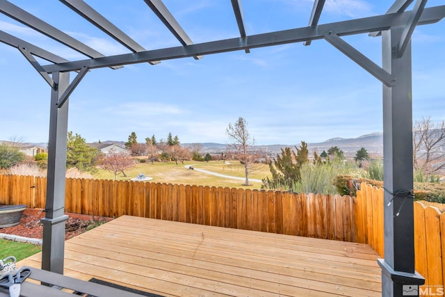 wooden terrace featuring a pergola and a mountain view