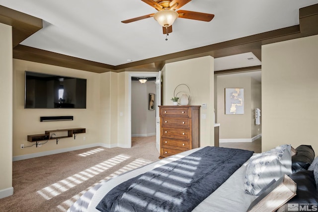 carpeted bedroom with a closet and ceiling fan