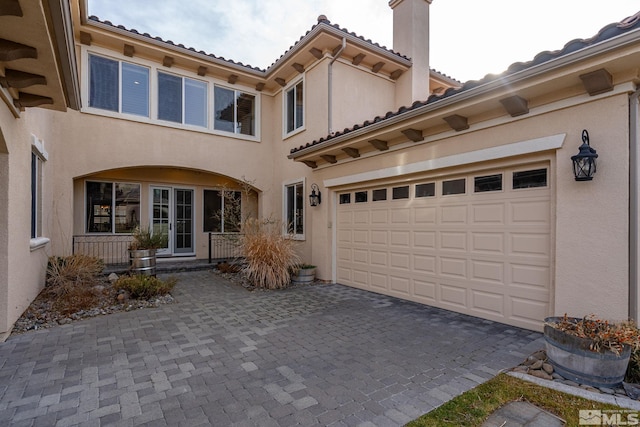 exterior space with a garage