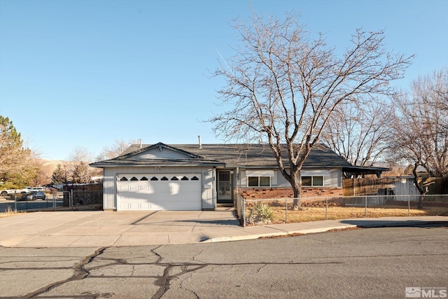 ranch-style home featuring a garage