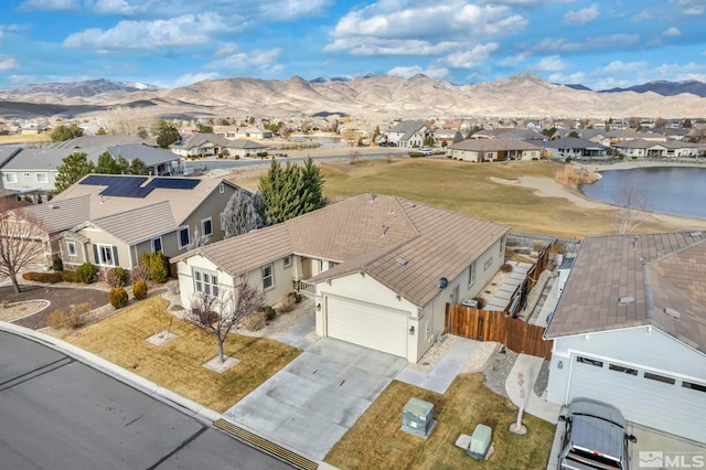 drone / aerial view featuring a mountain view