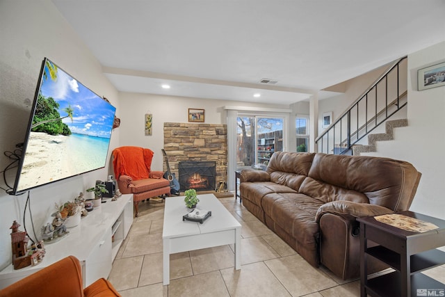 tiled living room with a fireplace