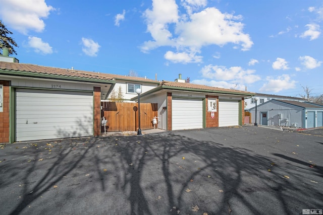 ranch-style home with a garage