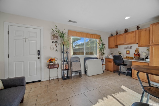 kitchen featuring light tile patterned flooring