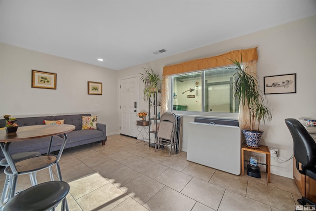 living room featuring light tile patterned flooring