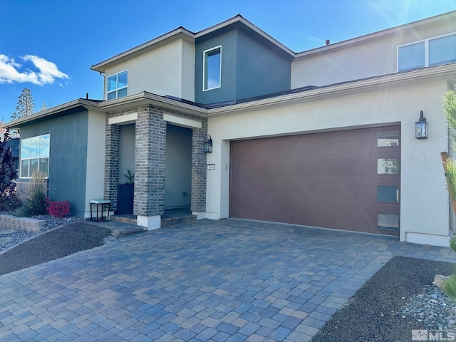 view of front of home with a garage