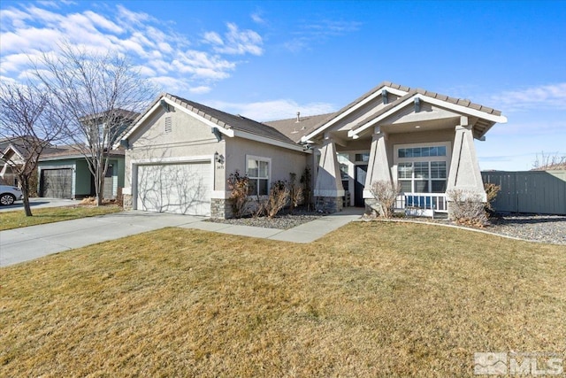 view of front facade featuring a front yard and a garage