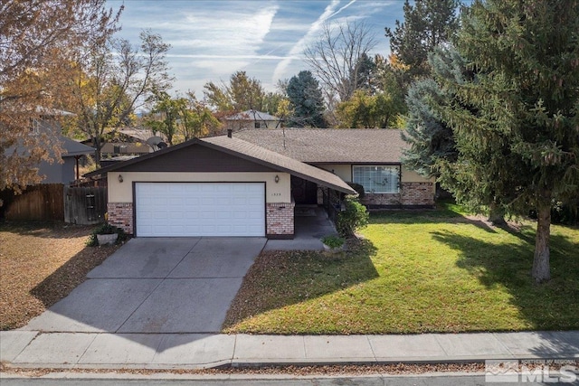 ranch-style home with a front yard and a garage