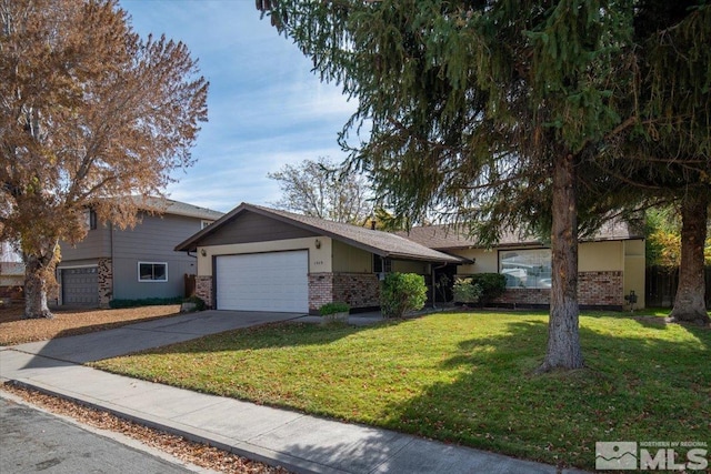 single story home featuring a front yard and a garage