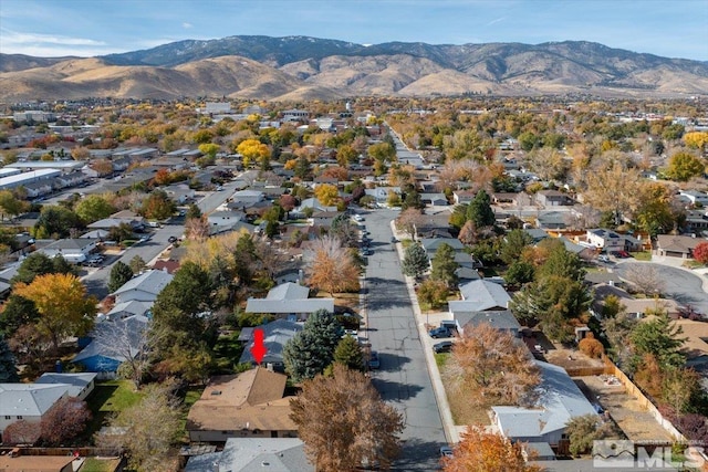 drone / aerial view featuring a mountain view