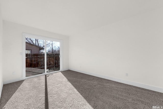 empty room with carpet flooring