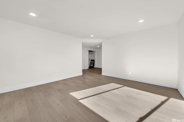 spare room with light wood-type flooring