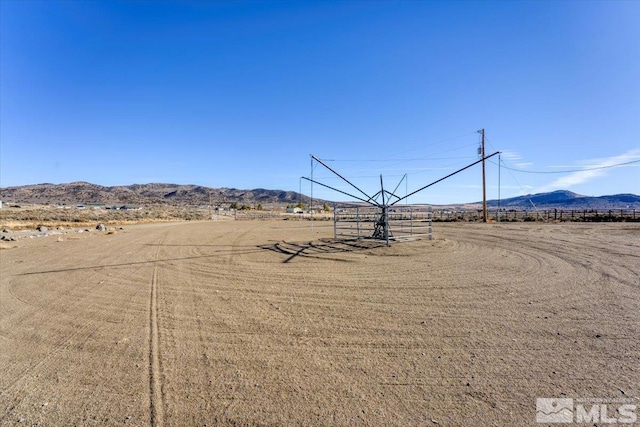 exterior space featuring a mountain view and a rural view