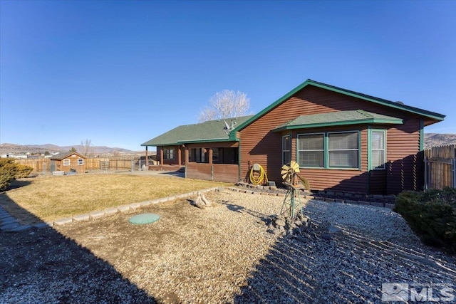 back of house with a patio