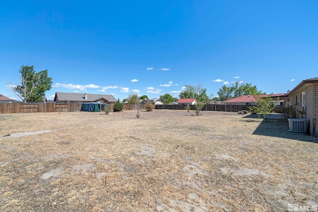 view of yard with central AC