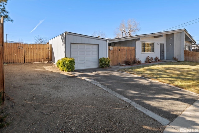 ranch-style house featuring a garage