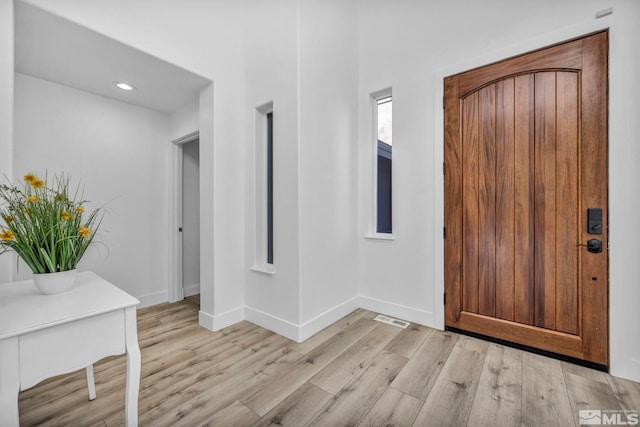 entrance foyer featuring light wood-type flooring